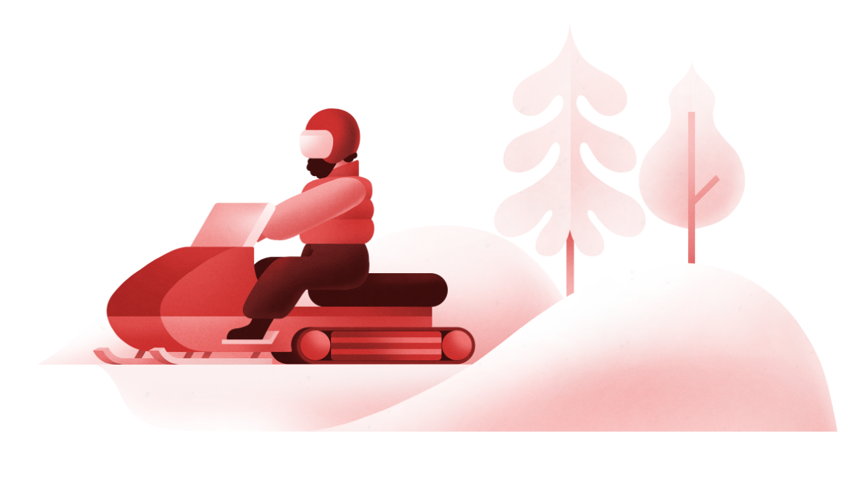 A person driving a snowmobile, with trees and snow in the background