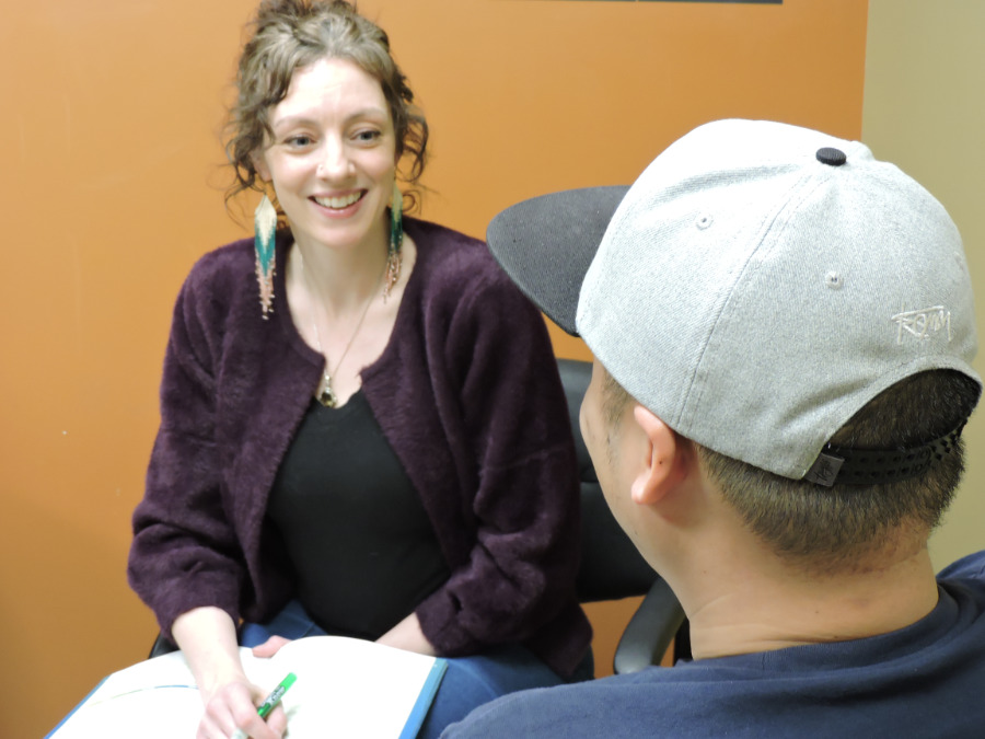 A Quitpath coach listens to a program participant.